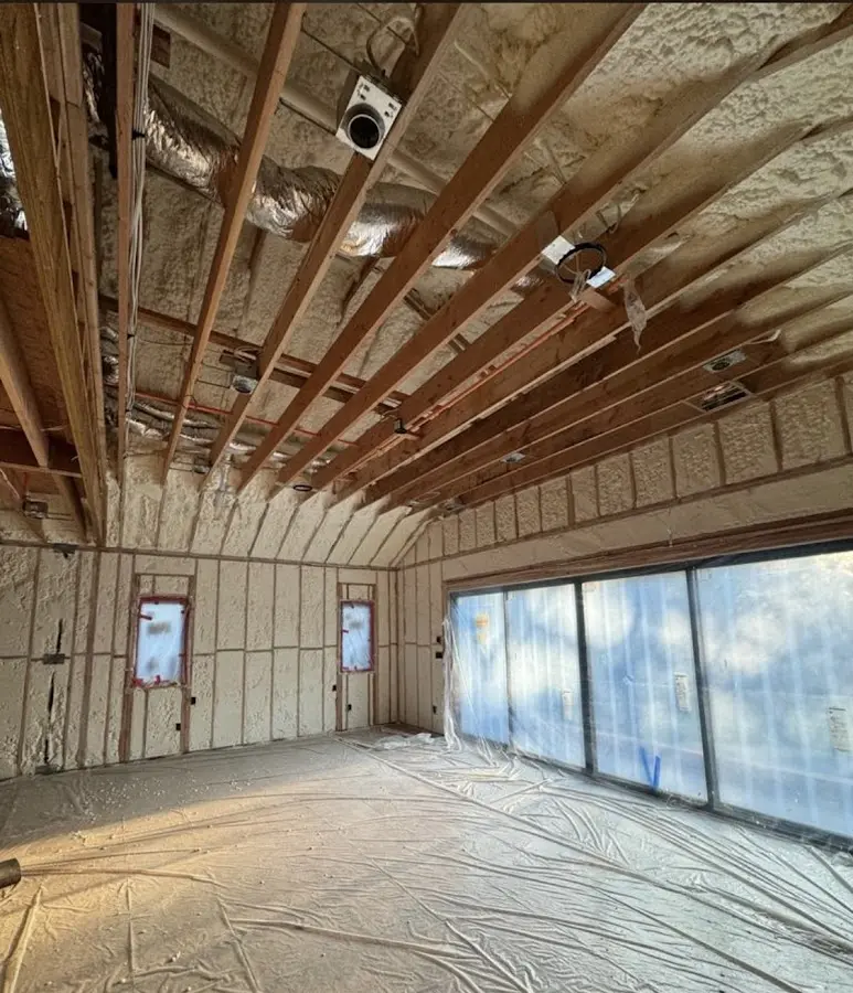 Interior walls and ceiling insulated with spray foam during new construction in Dunlap